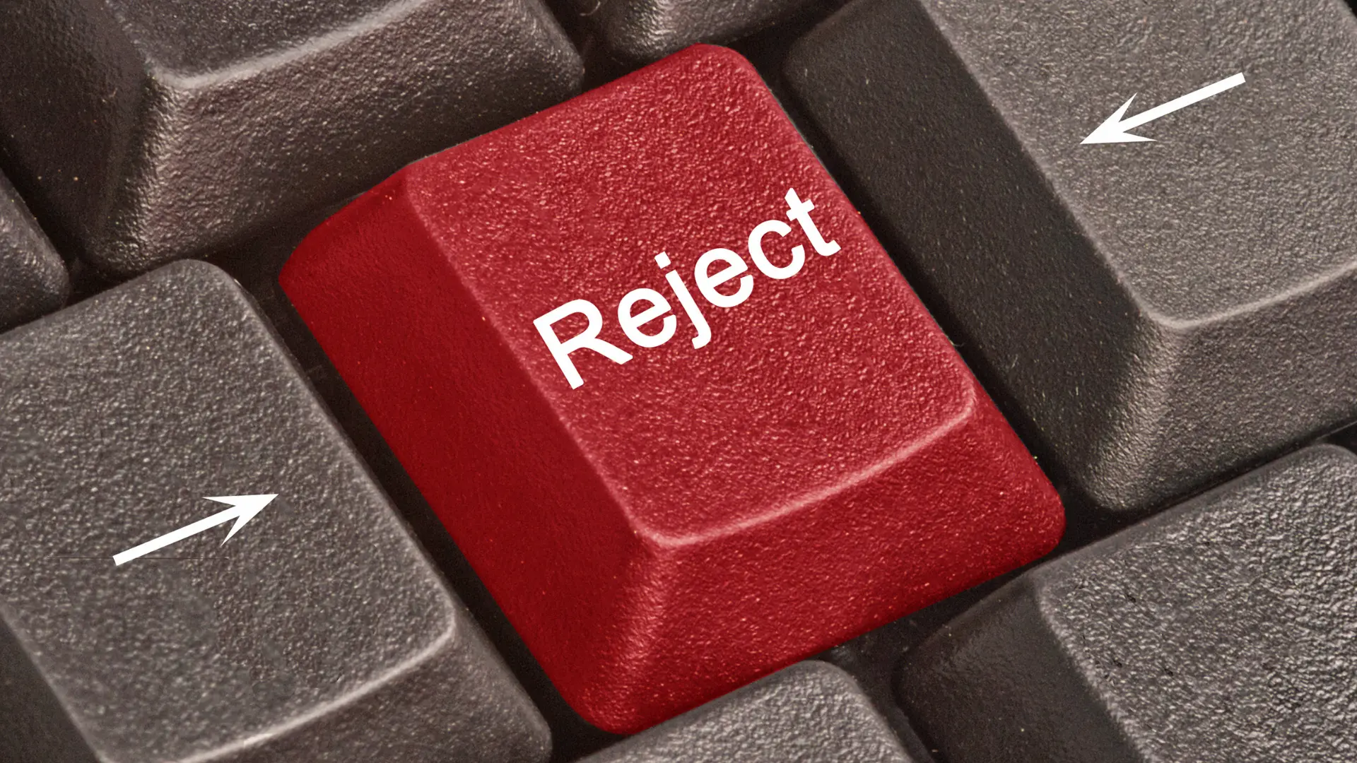 Keyboard with a red key, which reads "Reject"