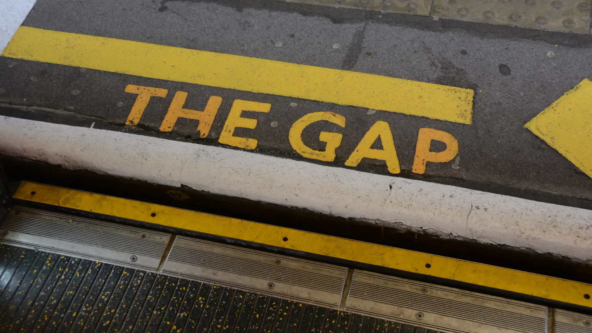Asphalt road with the words "The Gap" in yellow